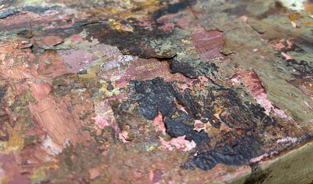 油彩画修復（剥離した絵具の固着）